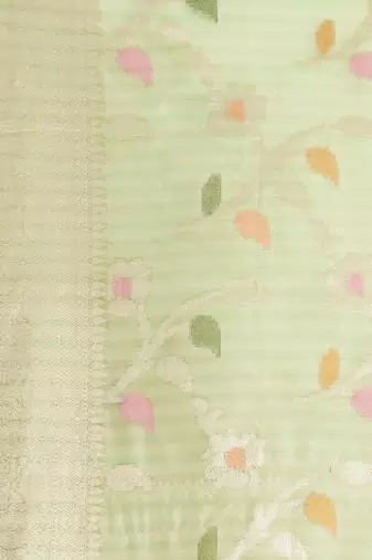 Green woven tissue saree with blouse