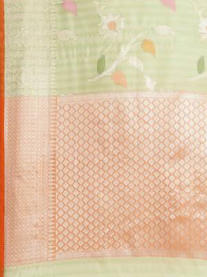 Green woven tissue saree with blouse 4