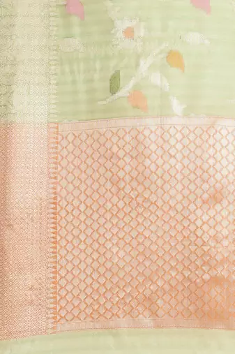 Green woven tissue saree with blouse