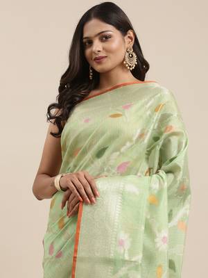 Green woven tissue saree with blouse 1