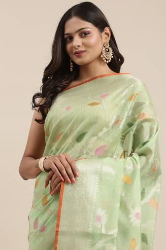 Green woven tissue saree with blouse