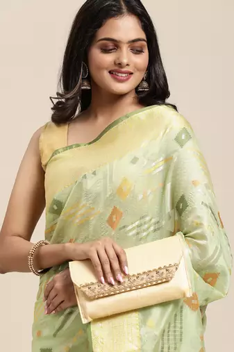 Green woven tissue saree with blouse