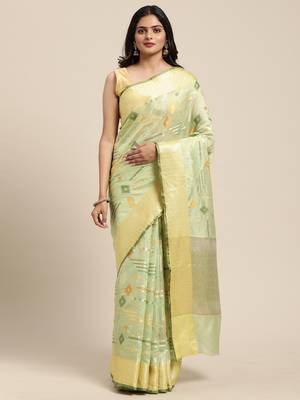Green woven tissue saree with blouse 1