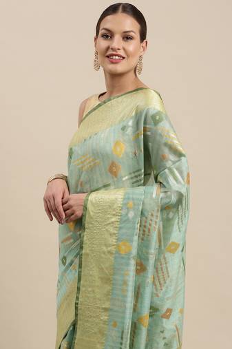 Green woven tissue saree with blouse