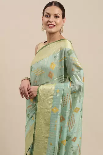 Green woven tissue saree with blouse