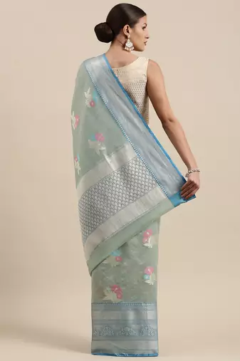 Green woven tissue saree with blouse