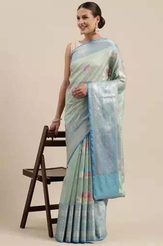 Green woven tissue saree with blouse