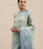 Green woven tissue saree with blouse