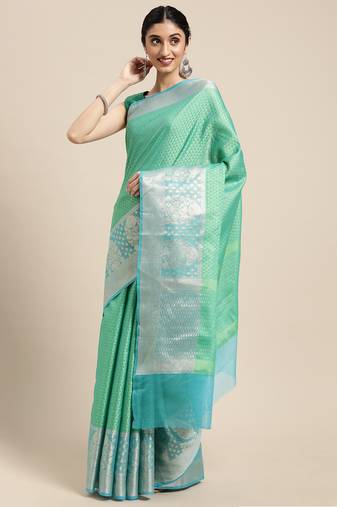 Green woven tissue saree with blouse