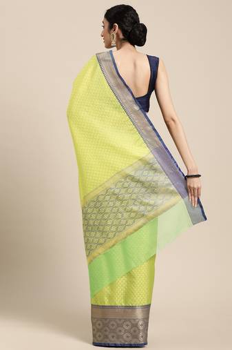 Green woven tissue saree with blouse