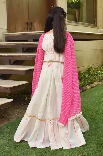 Off white embroidered lehenga set.