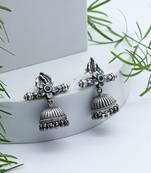 Silver earrings studded with gemstone