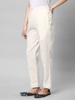 A off-white ankle length coton linen pant with plain belt in front. 4