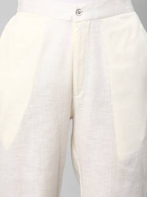 A off-white ankle length coton linen pant with plain belt in front. 5