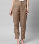 A brown ankle length coton linen pant with plain belt in front.