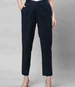 A blue ankle length coton linen pant with plain belt in front.