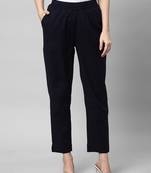 A fully elasticated navy ankle length cotton linen pant.