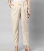 A fully elasticated cream ankle length cotton linen pant.