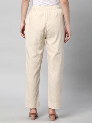 A fully elasticated cream ankle length cotton linen pant. 2