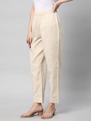 A fully elasticated cream ankle length cotton linen pant. 4