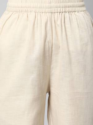 A fully elasticated cream ankle length cotton linen pant. 5