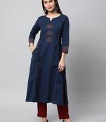A line kurta with block print and hand embroidery detail.