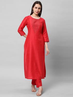 A straight kurta with machine embroidery at in v format yoke. 1