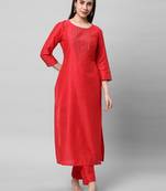 A straight kurta with machine embroidery at in v format yoke.