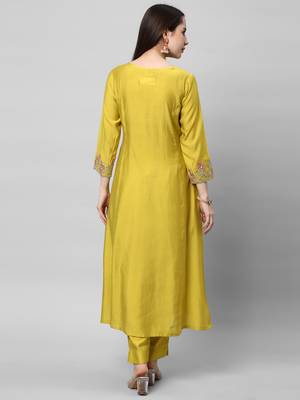 A line kurta in silk blend fabric with embroidered placket and sleeve. 2