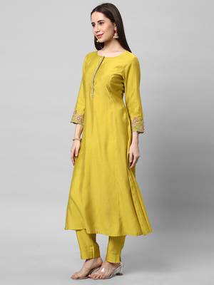 A line kurta in silk blend fabric with embroidered placket and sleeve. 4