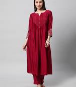 Pleated silk blend kurta with ornate zari embroidery and delicate hand work.