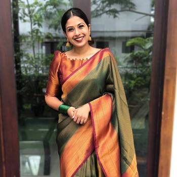 Dark Green Woven Faux Faux Kanjivaram Silk Saree With Blouse Piece 1