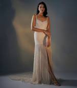Beige embroidered trail gown with slit