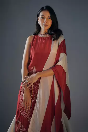 Red embroidered kurta sharara set.