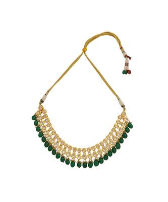 Gold toned kundan necklace with pair of earrings 4