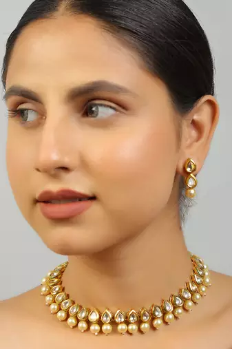 Kundan ivory beaded necklace with earrings