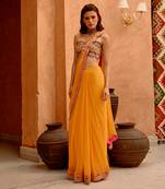 Mango yellow saree with bejewelled bandeau blouse
