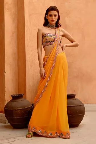 Mango yellow saree with bejewelled bandeau blouse