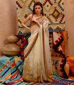 Fawn 'queen' saree with sleeveless tie-up blouse
