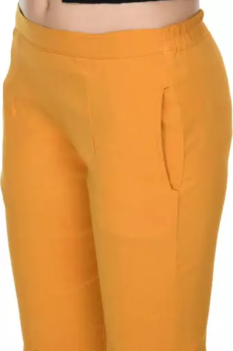 Pavonine mustard color stretchable cotton lycra fabric pencil trouser