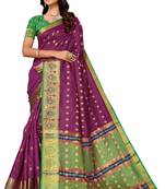 Wine colored zari woven butta with contrast border and blouse banarsi silk jacquard saree.