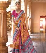 Elora Ethnic Wear Printed Patola Silk Blend Saree (Light Orange)