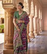 Elora Ethnic Wear Printed Patola Silk Blend Saree (Cornflower Pink And Green)