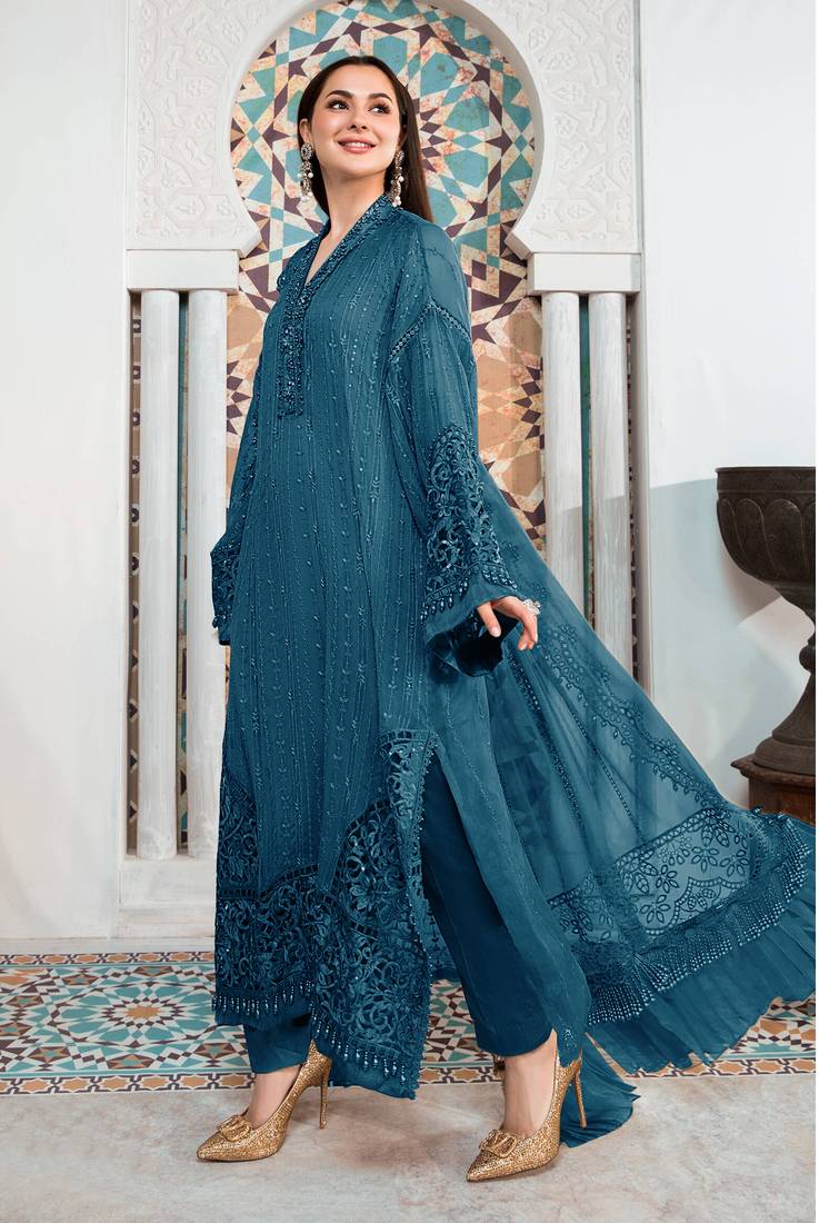 Teal green pakistani semi stitched suit with embroidery work
