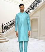 Sky blue dupion silk plain full sleeve kurta and churidar set for men