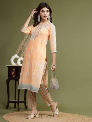 Women orange color embroidery kurta pant set 1