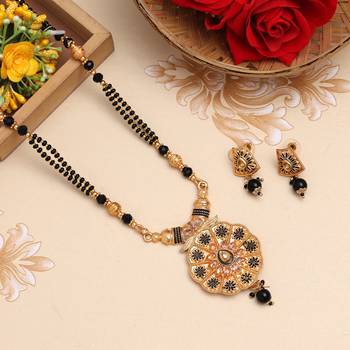 Gold color long mangalsutra with earrings 1