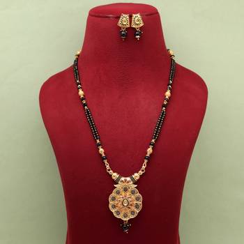 Gold color long mangalsutra with earrings 2