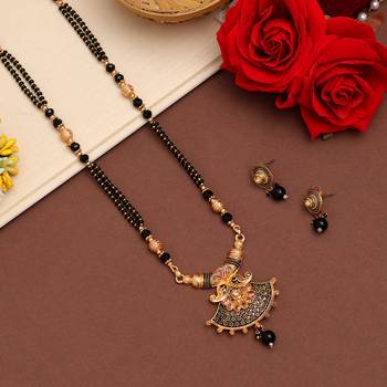 Gold color long mangalsutra with earrings 1