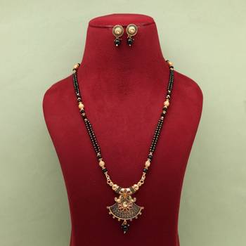 Gold color long mangalsutra with earrings 2